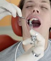 خطرات جراحی نکردن دندان نهفته